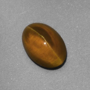 Натуральный жёлтый cat's eye apatite 2,02 карата прозрачный, полупрозрачный