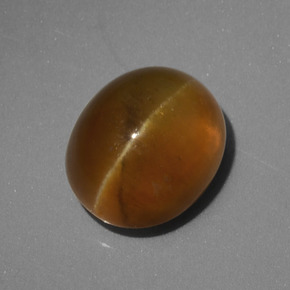 4.62 карата, натуральный Золотисто-зеленый Апатит Кошачий Глаз, Огранка Овал, Полупрозрачный