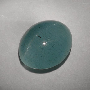 Натуральный зелёный cat's eye aquamarine 11,55 карата прозрачный, полупрозрачный