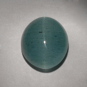 Натуральный зелёный cat's eye aquamarine 11,55 карата прозрачный, полупрозрачный