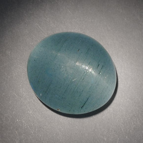 Натуральный зелёный cat's eye aquamarine 7,21 карата огранка овал, полупрозрачный
