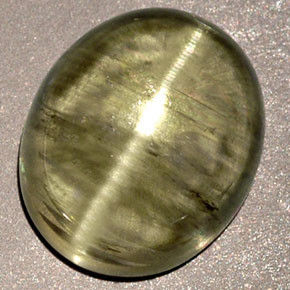 Натуральный зелёный cat's eye diaspore 6,32 карата прозрачный, полупрозрачный