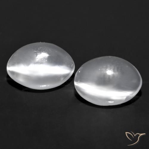 Натуральный белый cat's eye moonstone 1,41 карата огранка овал, прозрачный