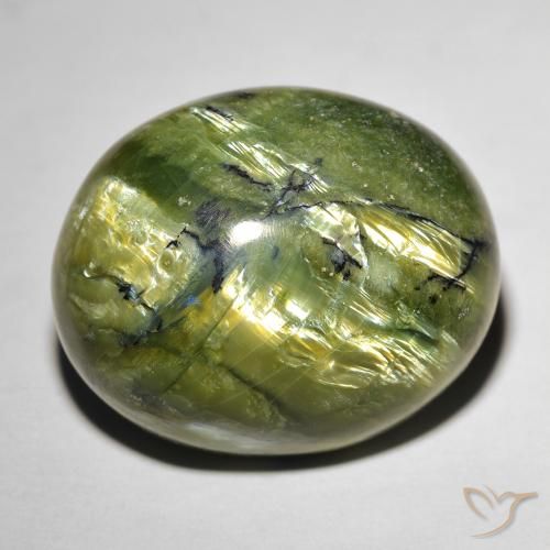 Натуральный зелёный cat's eye opal 20,74 карата огранка овал, непрозрачный