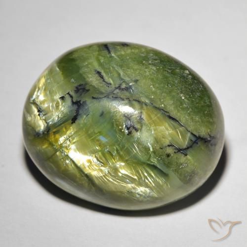Натуральный зелёный cat's eye opal 20,74 карата огранка овал, непрозрачный