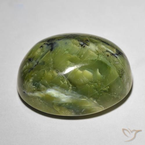 Натуральный зелёный cat's eye opal 20,74 карата огранка овал, непрозрачный