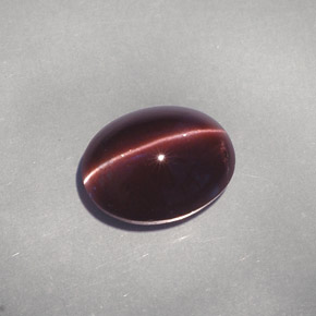 4.26 карата, натуральный Темно-коричневый Скаполит Кошачий Глаз, Огранка Овал, Полупрозрачный