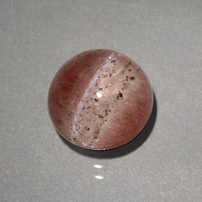 Натуральный коричневый cat's eye scapolite 2,23 карата прозрачный, полупрозрачный