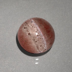 Натуральный коричневый cat's eye scapolite 2,23 карата прозрачный, полупрозрачный