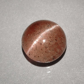 Натуральный коричневый cat's eye scapolite 1,96 карата прозрачный, полупрозрачный