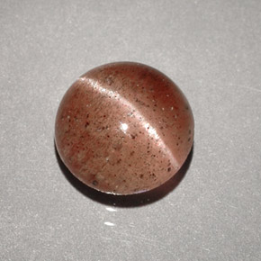Натуральный коричневый cat's eye scapolite 1,96 карата прозрачный, полупрозрачный