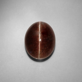 Натуральный коричневый cat's eye scapolite 8,31 карата огранка овал, полупрозрачный