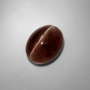Натуральный коричневый cat's eye scapolite 8,31 карата огранка овал, полупрозрачный