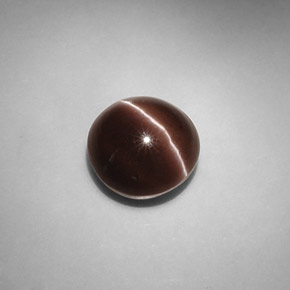 Натуральный коричневый cat's eye scapolite 5,82 карата огранка круг, полупрозрачный