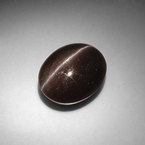 Натуральный коричневый cat's eye scapolite 8,66 карата огранка овал, полупрозрачный