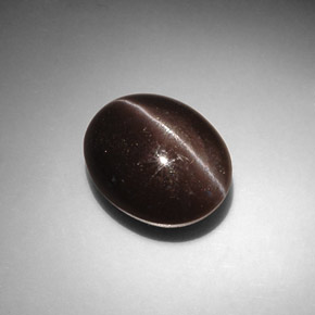 Натуральный коричневый cat's eye scapolite 8,66 карата огранка овал, полупрозрачный