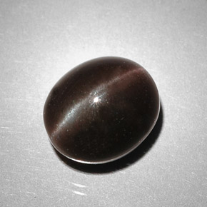 5.85 карата, натуральный Темно-коричневый Скаполит Кошачий Глаз, Огранка Овал, Полупрозрачный