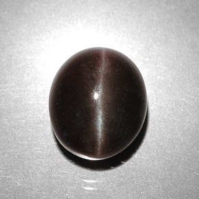 5.85 карата, натуральный Темно-коричневый Скаполит Кошачий Глаз, Огранка Овал, Полупрозрачный