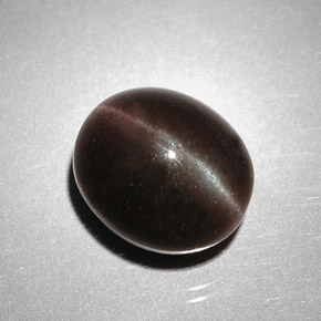 5.85 карата, натуральный Темно-коричневый Скаполит Кошачий Глаз, Огранка Овал, Полупрозрачный