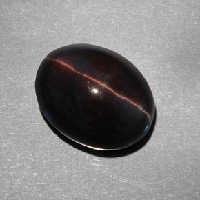 Натуральный коричневый cat's eye scapolite 9,21 карата огранка овал, полупрозрачный