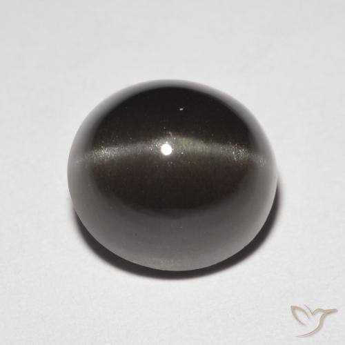 Натуральный коричневый cat's eye scapolite 3,32 карата огранка овал, полупрозрачный