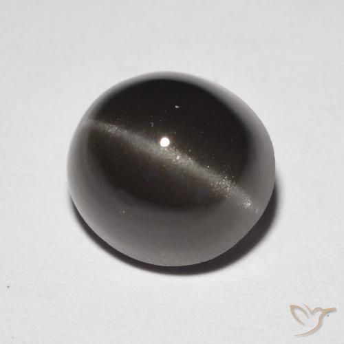 Натуральный коричневый cat's eye scapolite 3,32 карата огранка овал, полупрозрачный