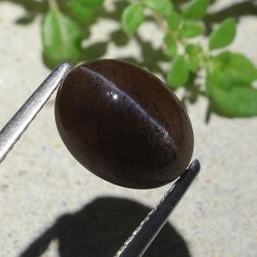 4.04 карата, натуральный Теплый черный Скаполит Кошачий Глаз, Огранка Овал, Полупрозрачный