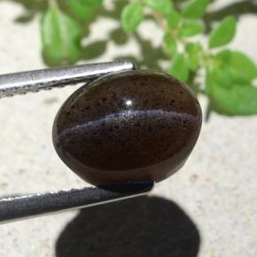 4.04 карата, натуральный Теплый черный Скаполит Кошачий Глаз, Огранка Овал, Полупрозрачный