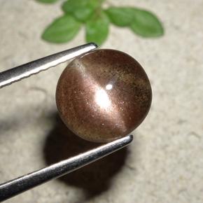 Натуральный коричневый cat's eye scapolite 1,76 карата огранка круг, полупрозрачный