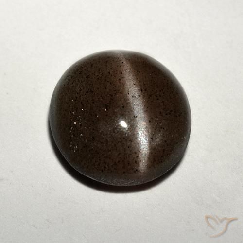 Натуральный коричневый cat's eye scapolite 1,50 карата огранка круг, полупрозрачный