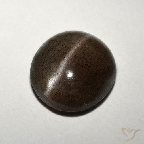 Натуральный коричневый cat's eye scapolite 1,50 карата огранка круг, полупрозрачный