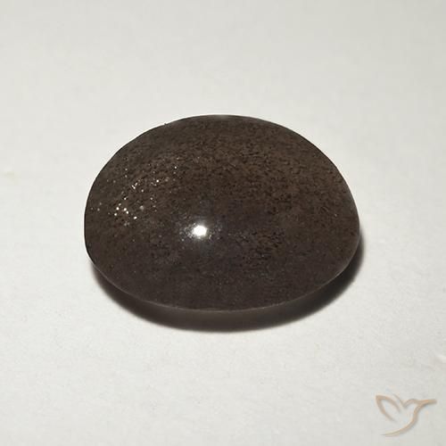 Натуральный коричневый cat's eye scapolite 1,50 карата огранка круг, полупрозрачный