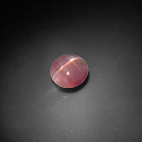 Натуральный розовый cat's eye tourmaline 1,04 карата прозрачный, полупрозрачный