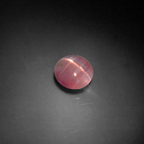 Натуральный розовый cat's eye tourmaline 1,04 карата прозрачный, полупрозрачный
