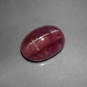 Натуральный розовый cat's eye tourmaline 2,61 карата прозрачный, полупрозрачный