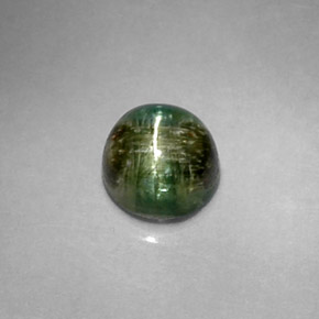 Натуральный зелёный cat's eye tourmaline 1,20 карата огранка круг, непрозрачный