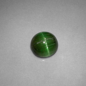 Натуральный зелёный cat's eye tourmaline 0,85 карата огранка круг, непрозрачный