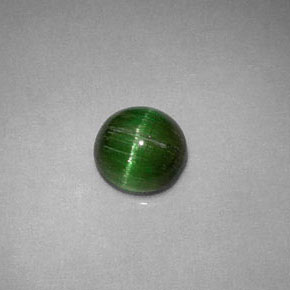 Натуральный зелёный cat's eye tourmaline 0,85 карата огранка круг, непрозрачный