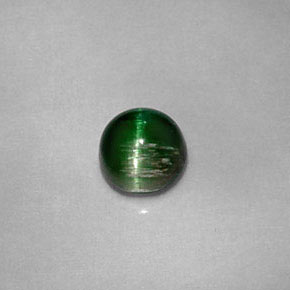 Натуральный зелёный cat's eye tourmaline 0,67 карата огранка круг, непрозрачный