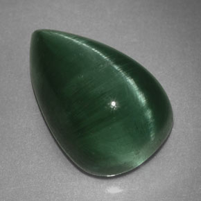 Натуральный зелёный cat's eye tourmaline 2,46 карата прозрачный, полупрозрачный