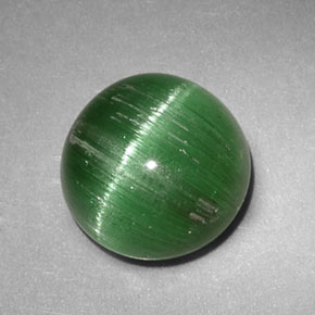 Натуральный зелёный cat's eye tourmaline 2,47 карата огранка круг, полупрозрачный