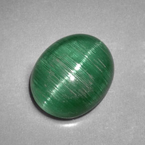 Натуральный зелёный cat's eye tourmaline 2,09 карата прозрачный, полупрозрачный