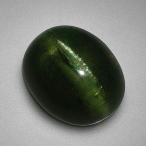 Натуральный зелёный cat's eye tourmaline 5,99 карата огранка овал, полупрозрачный