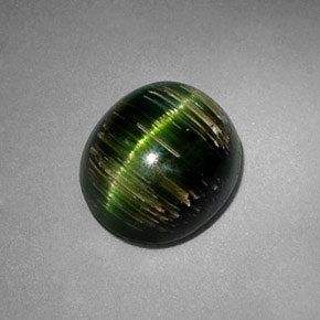 Натуральный зелёный cat's eye tourmaline 3,24 карата огранка овал, полупрозрачный