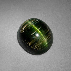 Натуральный зелёный cat's eye tourmaline 3,24 карата огранка овал, полупрозрачный