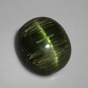 Натуральный зелёный cat's eye tourmaline 3,24 карата огранка овал, непрозрачный