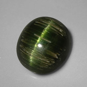 Натуральный зелёный cat's eye tourmaline 3,24 карата огранка овал, непрозрачный