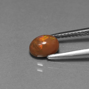 0.69 карата, натуральный Многоцветный Шоколадный опал, Огранка Овал, Непрозрачный