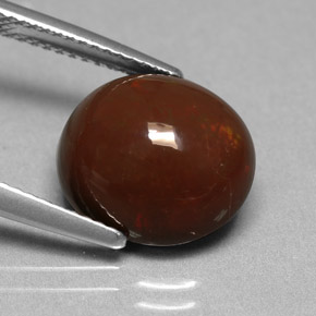 5.05 карата, натуральный Многоцветный Шоколадный опал, Огранка Овал, Непрозрачный