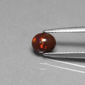 0.43 карата, натуральный Многоцветный Шоколадный опал, Огранка Овал, Непрозрачный